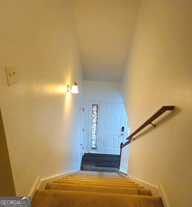 bonus room with ceiling fan, light colored carpet, lofted ceiling, and a textured ceiling