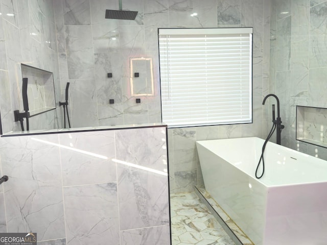 bathroom featuring independent shower and bath and tile walls