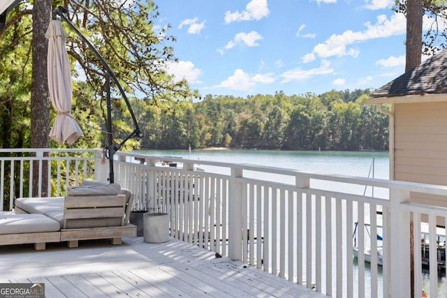 deck featuring a water view