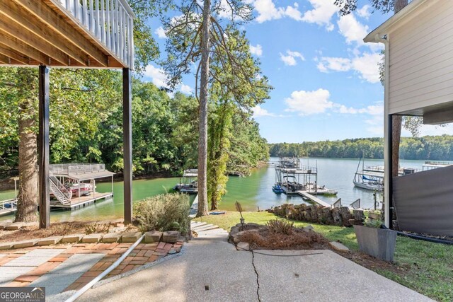 view of patio / terrace with a water view