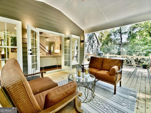 sunroom with vaulted ceiling