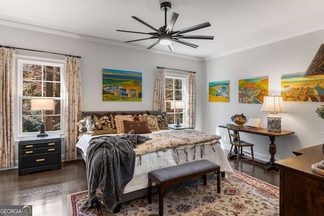 bedroom featuring baseboards, crown molding, dark wood-type flooring, and a ceiling fan