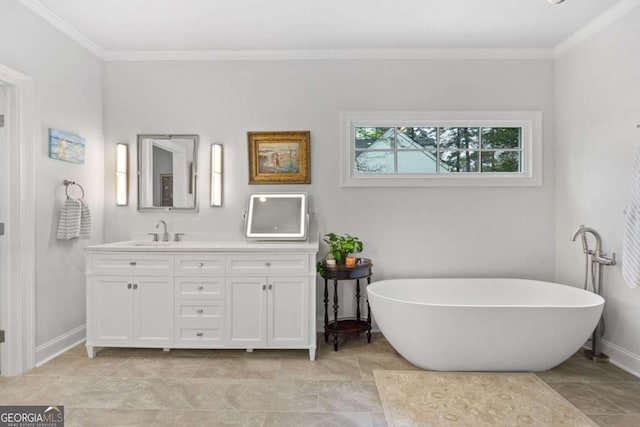 full bathroom with baseboards, double vanity, a soaking tub, a sink, and crown molding