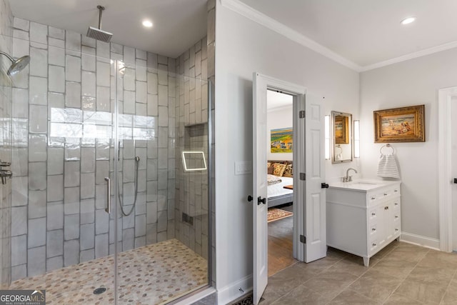 ensuite bathroom with visible vents, crown molding, vanity, a stall shower, and ensuite bath