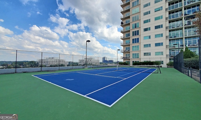 view of sport court featuring basketball court