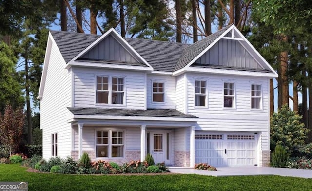 craftsman house featuring a garage and a front lawn