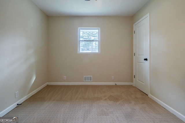 view of carpeted spare room