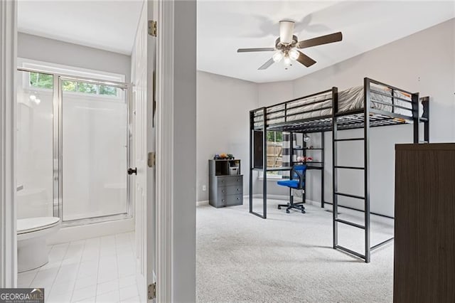 bedroom featuring light carpet