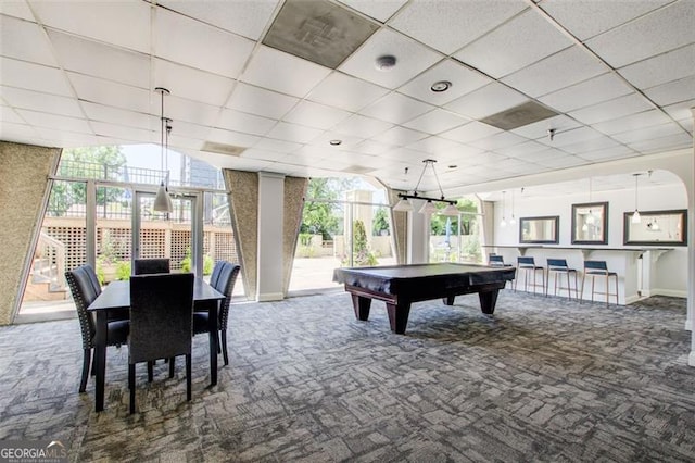 game room with carpet flooring, expansive windows, a drop ceiling, and pool table