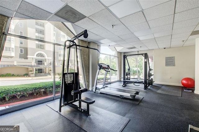 gym with floor to ceiling windows