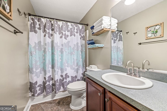 full bathroom with toilet, a textured ceiling, vanity, and shower / tub combo with curtain