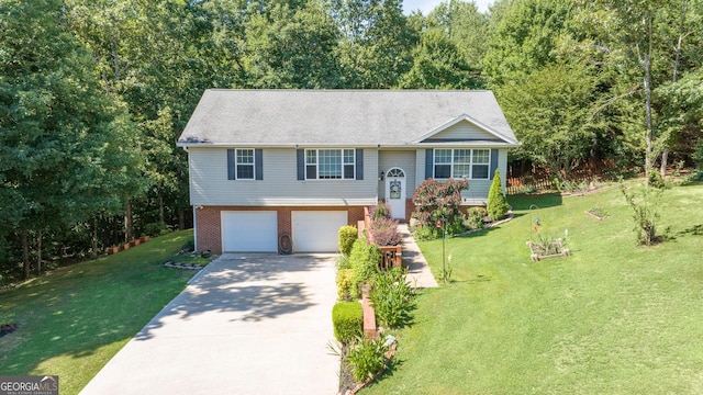 split foyer home with a front lawn and a garage