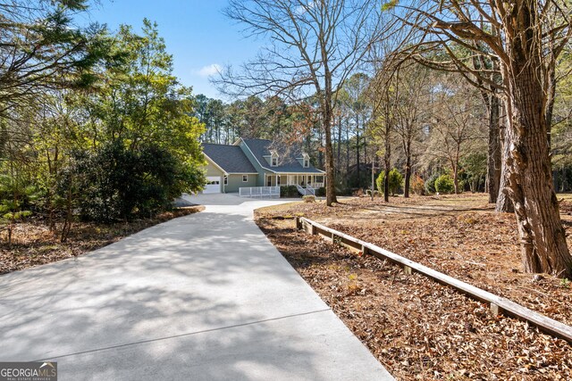 view of yard with a garage