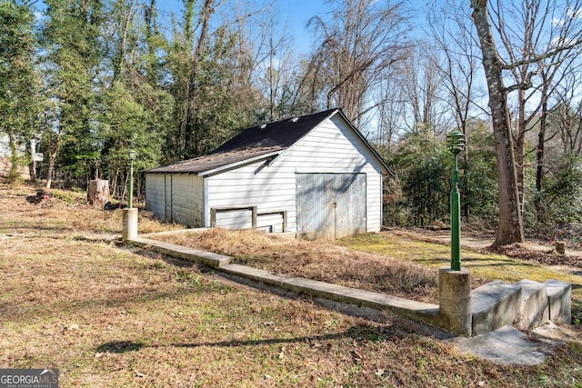 view of outbuilding featuring a garage