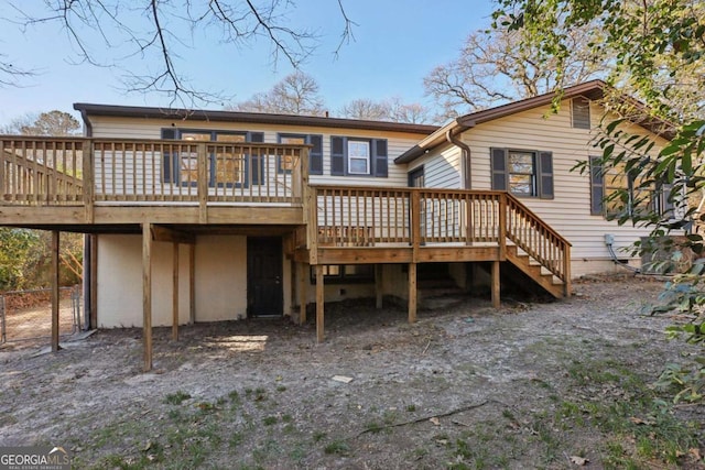 rear view of house with a deck