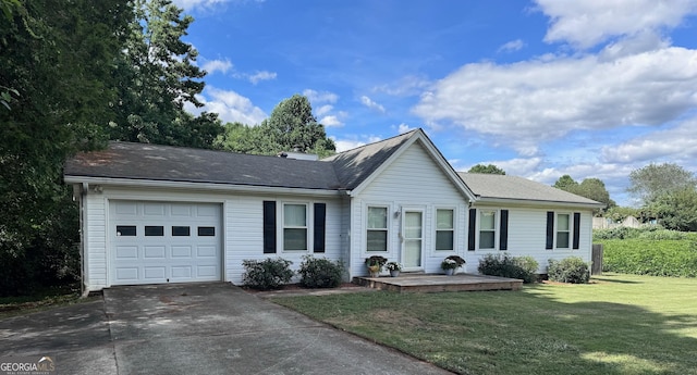 ranch-style house with a garage and a front yard