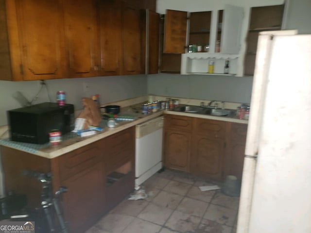 kitchen with sink and white appliances