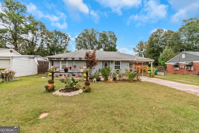 single story home with a front yard and a carport