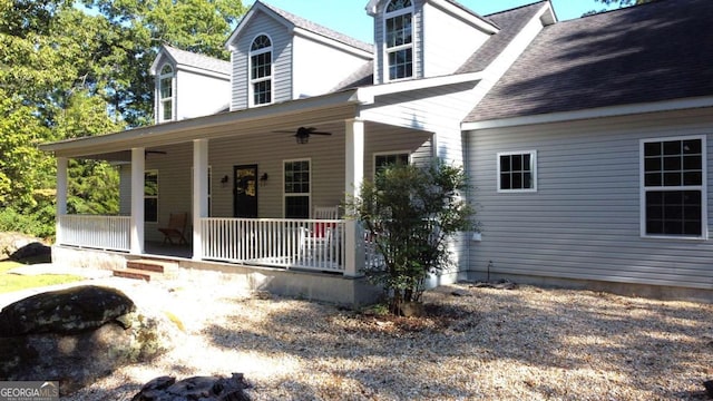 view of front of house featuring ceiling fan and covered porch