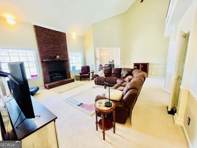 carpeted living room featuring a fireplace and high vaulted ceiling