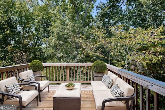 wooden deck with an outdoor hangout area