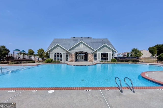 view of swimming pool featuring a patio