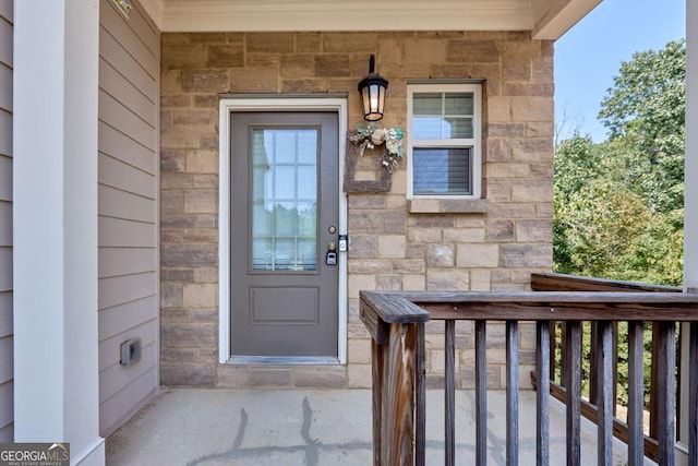 entrance to property with covered porch