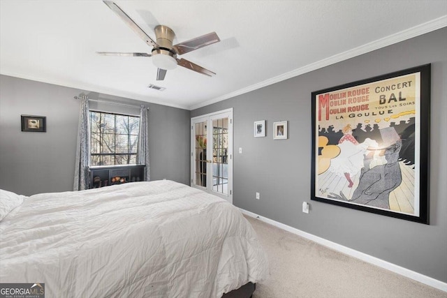 carpeted bedroom featuring access to outside, ceiling fan, and crown molding