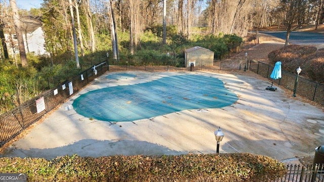 view of swimming pool featuring a patio