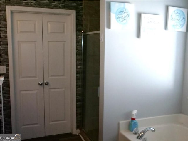 bathroom with plus walk in shower