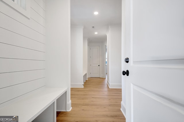 corridor featuring light hardwood / wood-style flooring