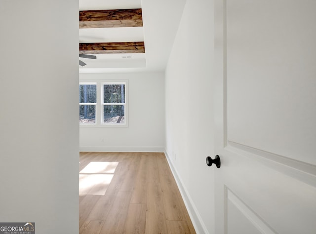 hallway with light wood-type flooring