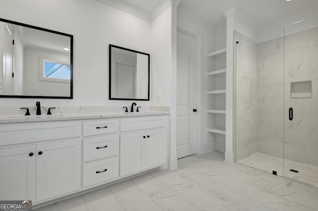 bathroom with an enclosed shower, vanity, crown molding, and built in shelves