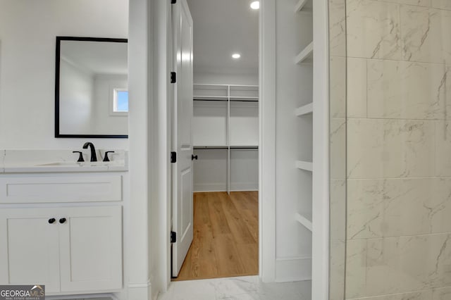 interior space featuring light hardwood / wood-style floors and sink