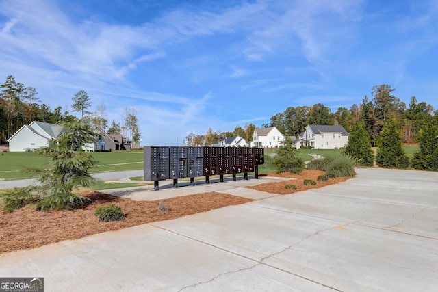 view of property's community featuring a mail area