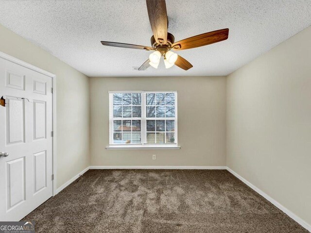 view of side of property featuring central AC unit and a garage