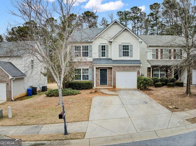 front of property with a garage