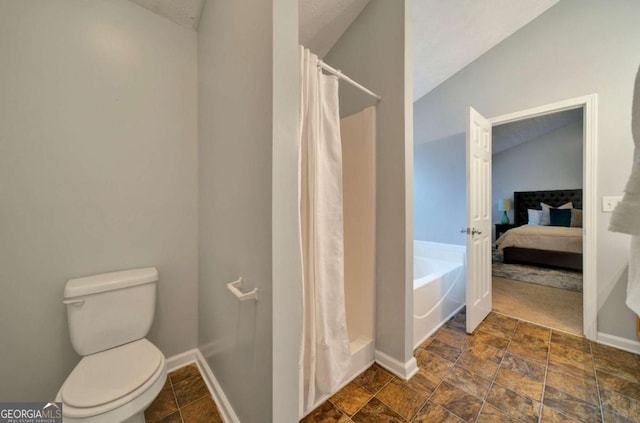 bathroom featuring lofted ceiling, shower with separate bathtub, and toilet