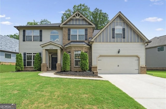 craftsman-style house with a garage and a front lawn