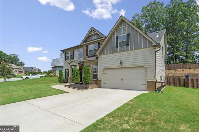 craftsman inspired home with a front yard and a garage