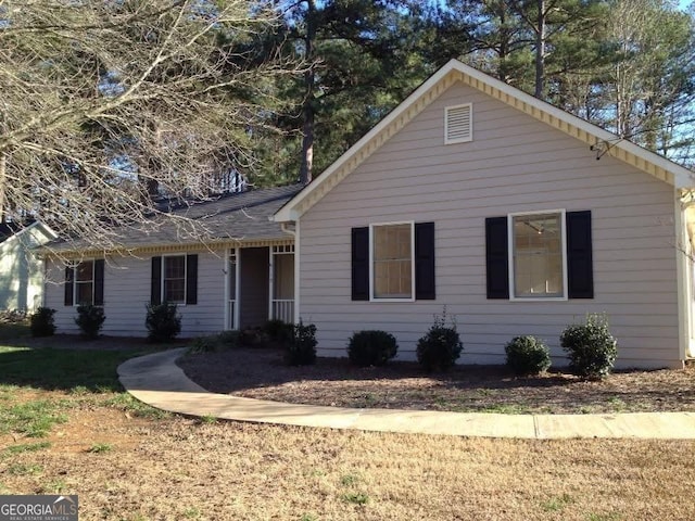 ranch-style house with a front yard