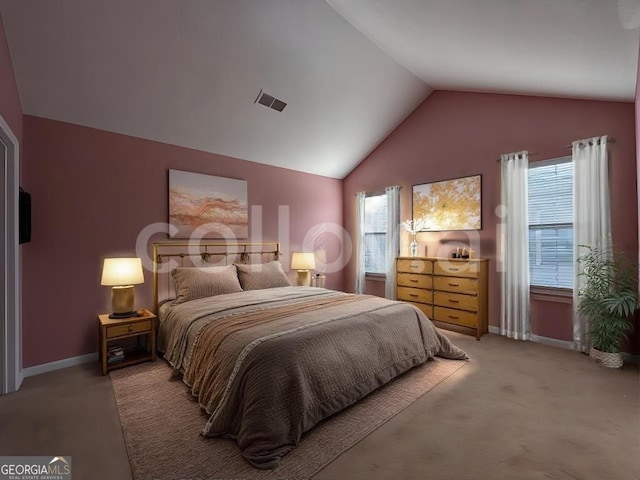 bedroom with carpet flooring and vaulted ceiling