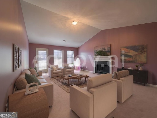 carpeted living room featuring vaulted ceiling