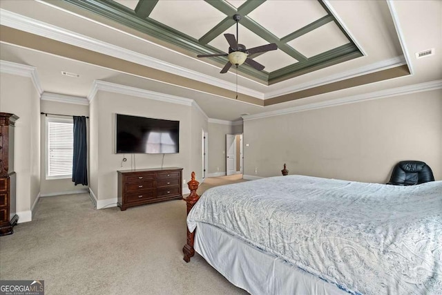 carpeted bedroom with a raised ceiling, ceiling fan, and crown molding