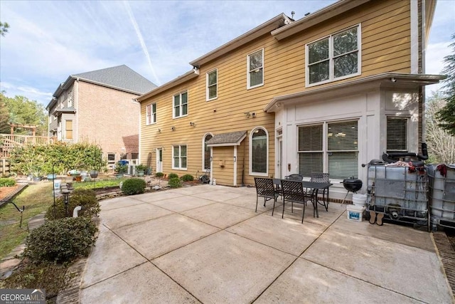 rear view of house with a patio area