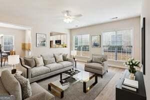 living room with light hardwood / wood-style floors and ceiling fan