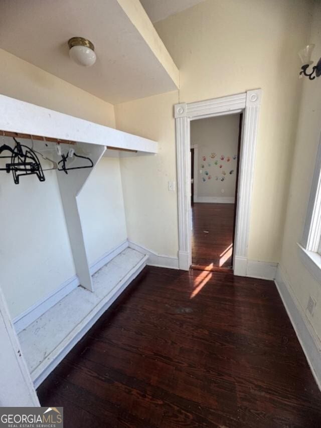 mudroom with dark hardwood / wood-style flooring