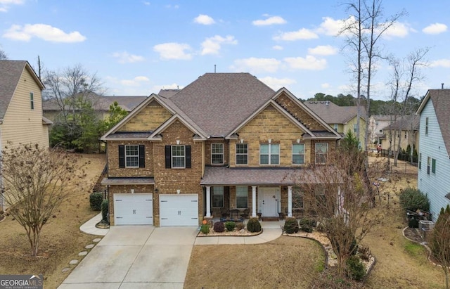 view of front of home featuring brick siding, a shingled roof, covered porch, concrete driveway, and a garage