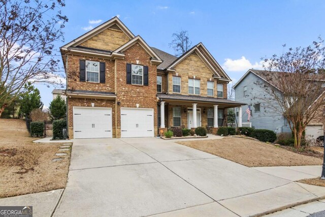 craftsman inspired home with a garage