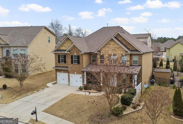 view of front of house featuring a garage and central AC unit